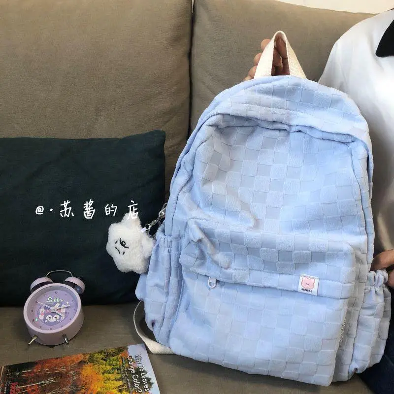 Mochila Azul Texturizada com Pingente