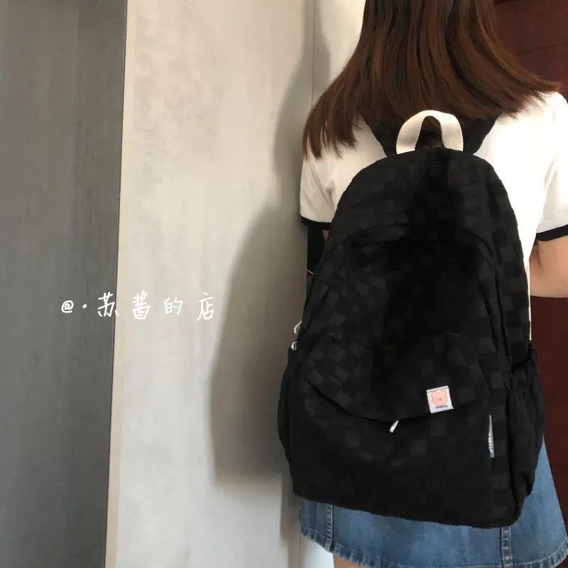 Mochila Azul Texturizada com Pingente