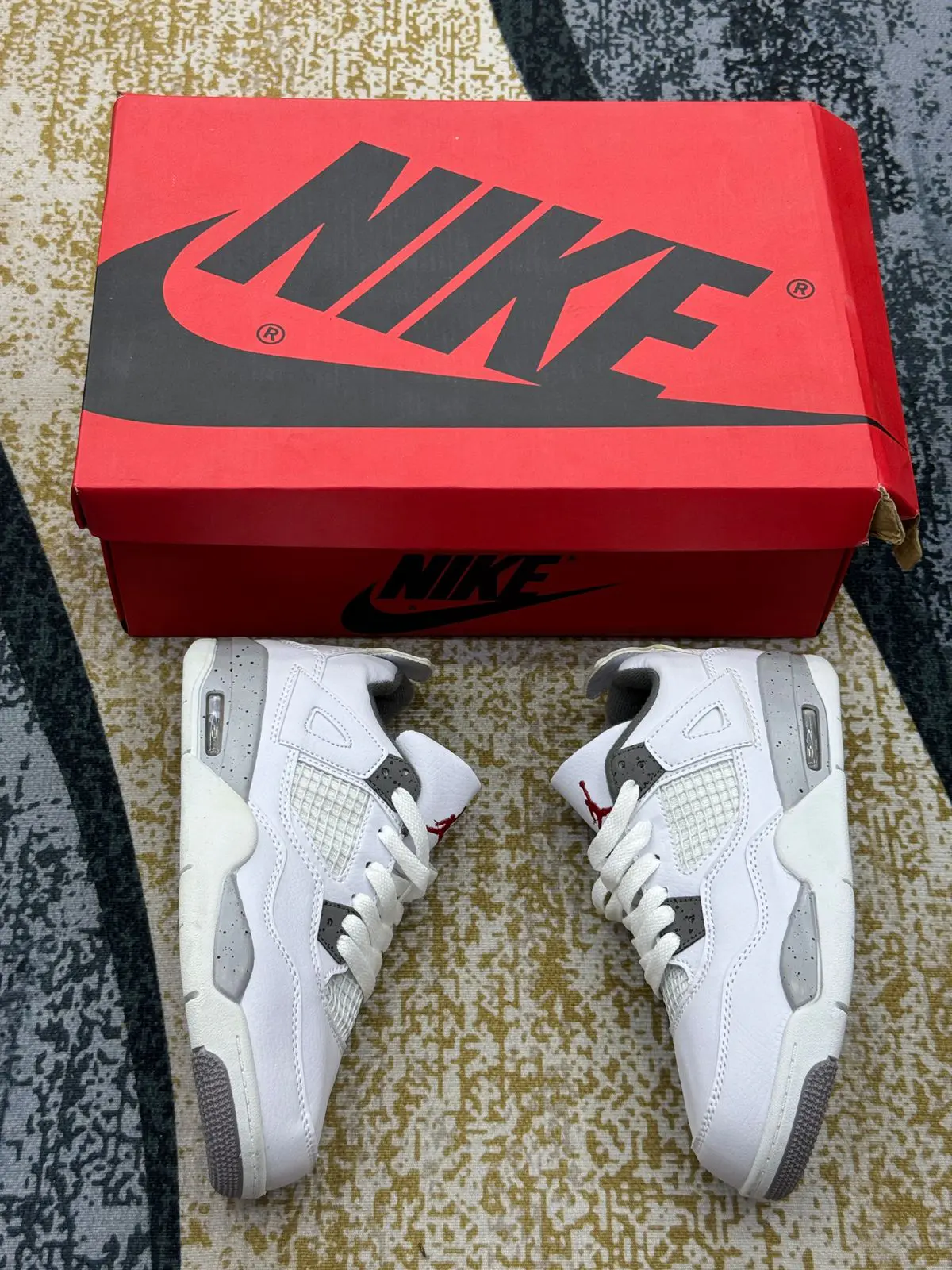 Tênis Nike Air Jordan 4 Retro Infantil