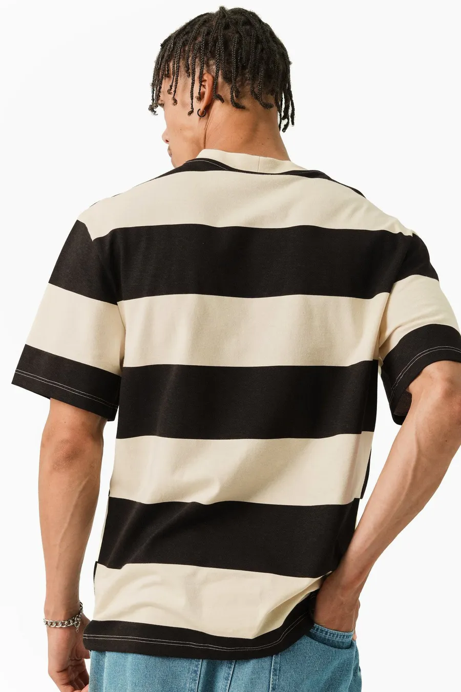 T-shirt largo em algodão · Homem · Preto