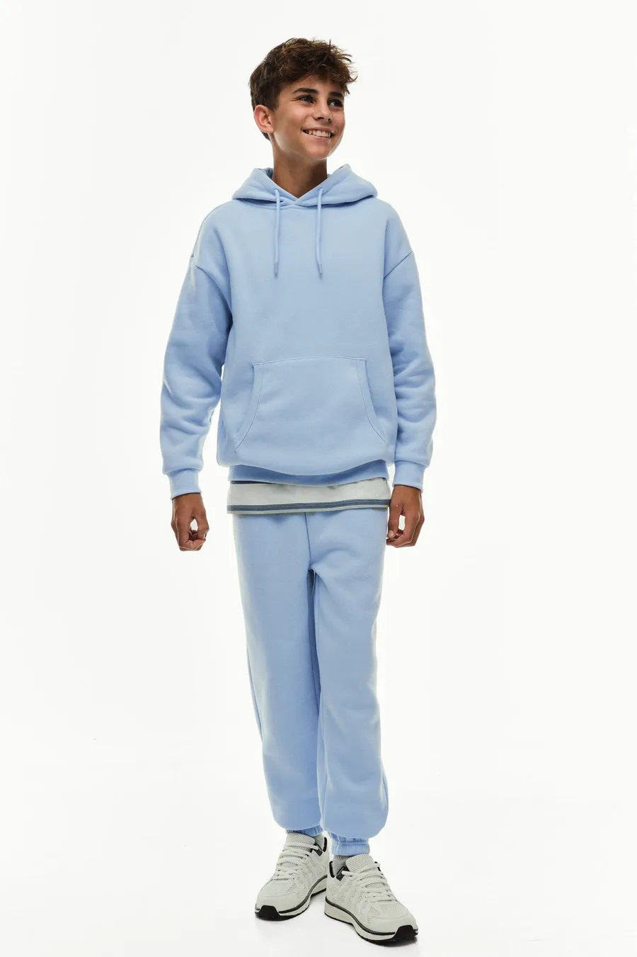 Calças jogger em poliéster · Menino · Azul Claro