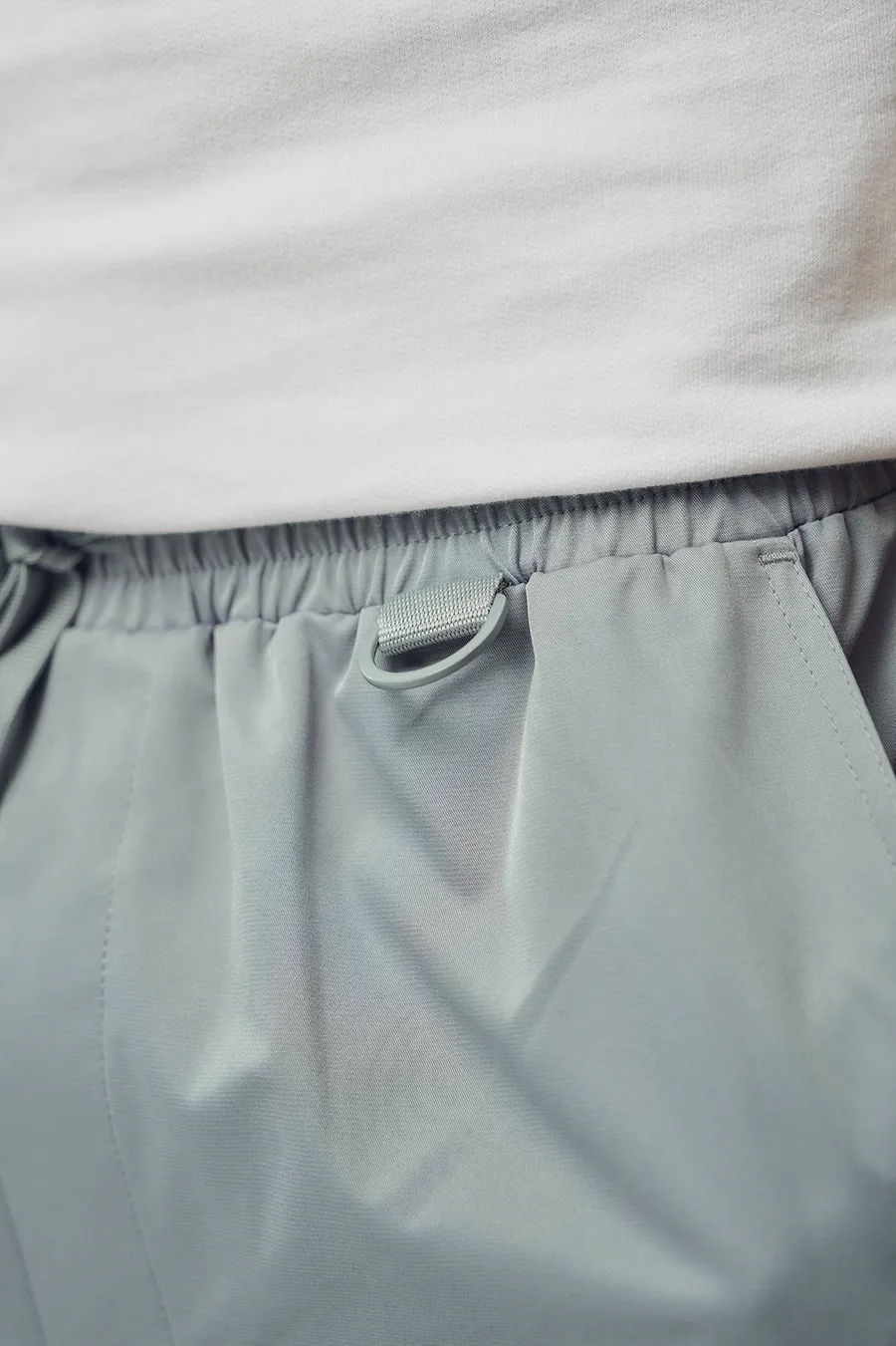 Calças jogger em poliéster · Homem · Cinzento Escuro