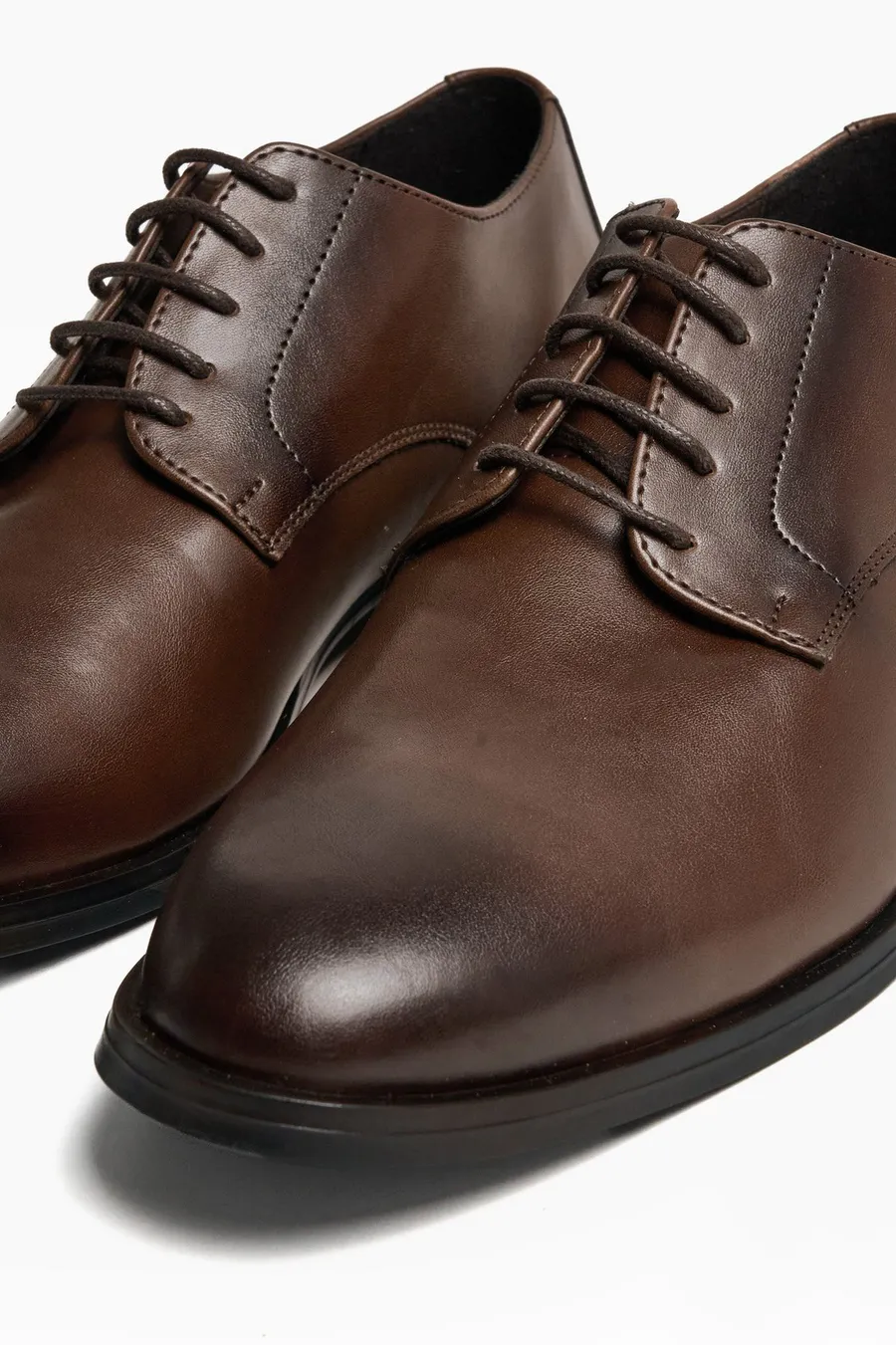 Sapatos com atacadores · Homem