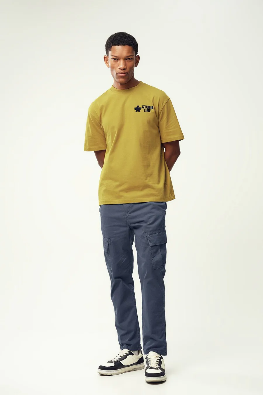 Calças Tapered em algodão · Homem · Azul
