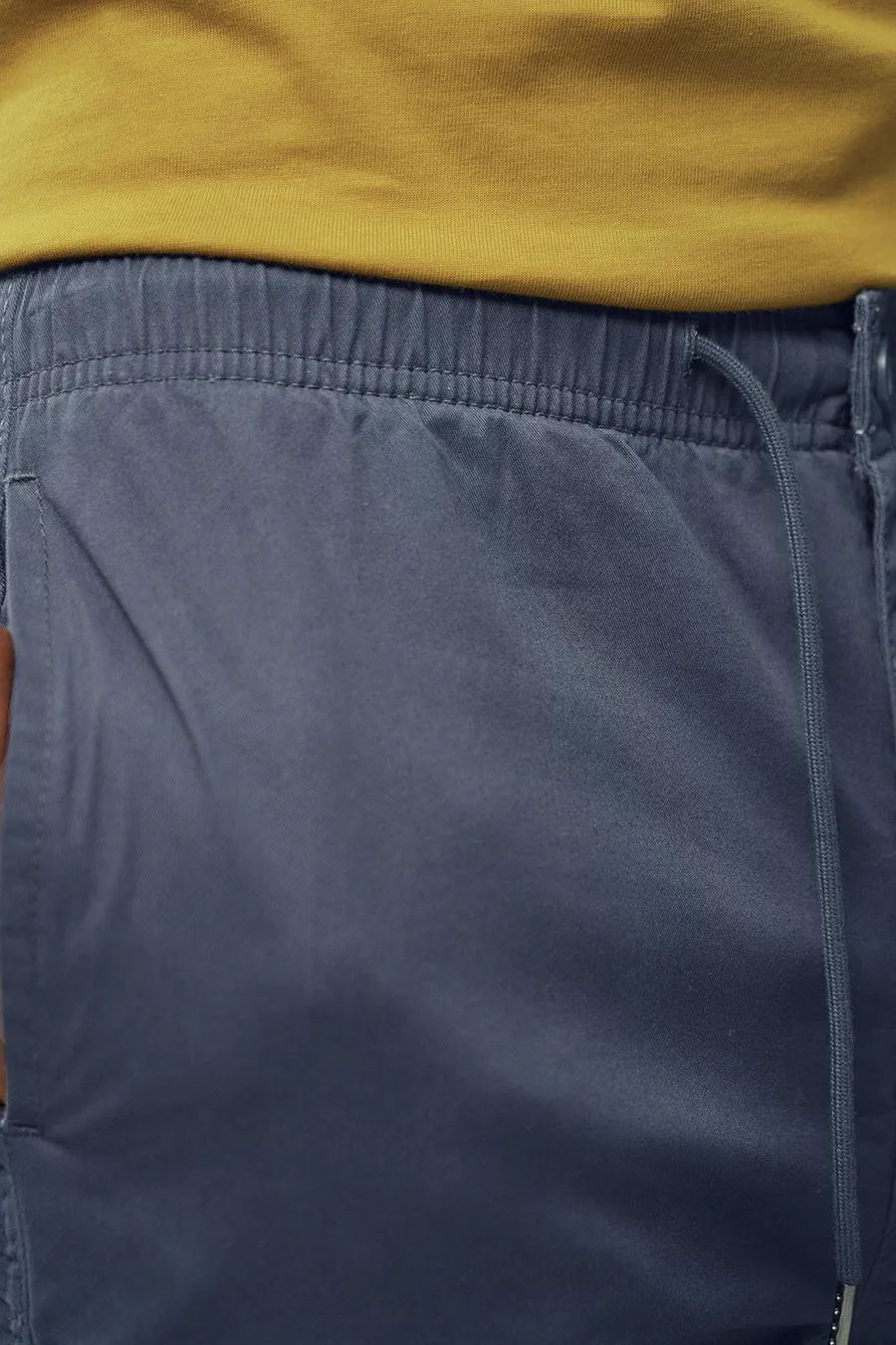 Calças Tapered em algodão · Homem · Azul