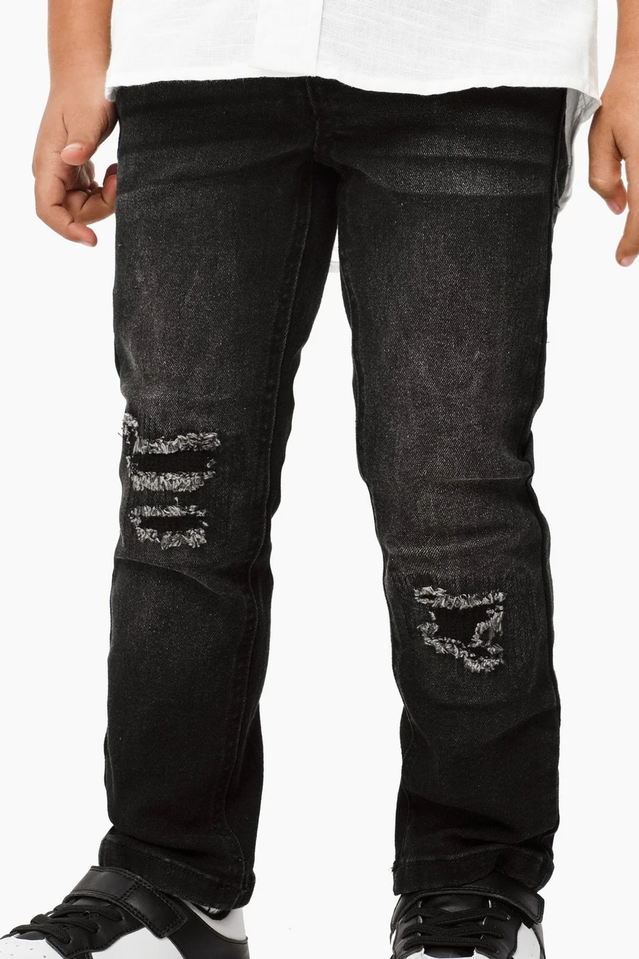 Calças de ganga skinny · Menino