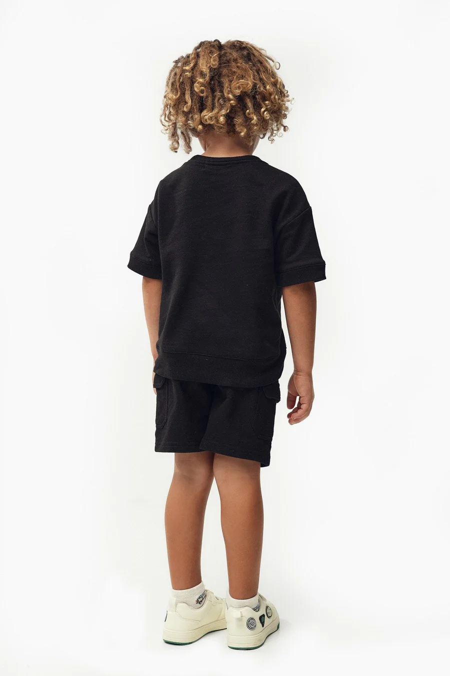 T-shirt Boxy em algodão · Menino · Preto